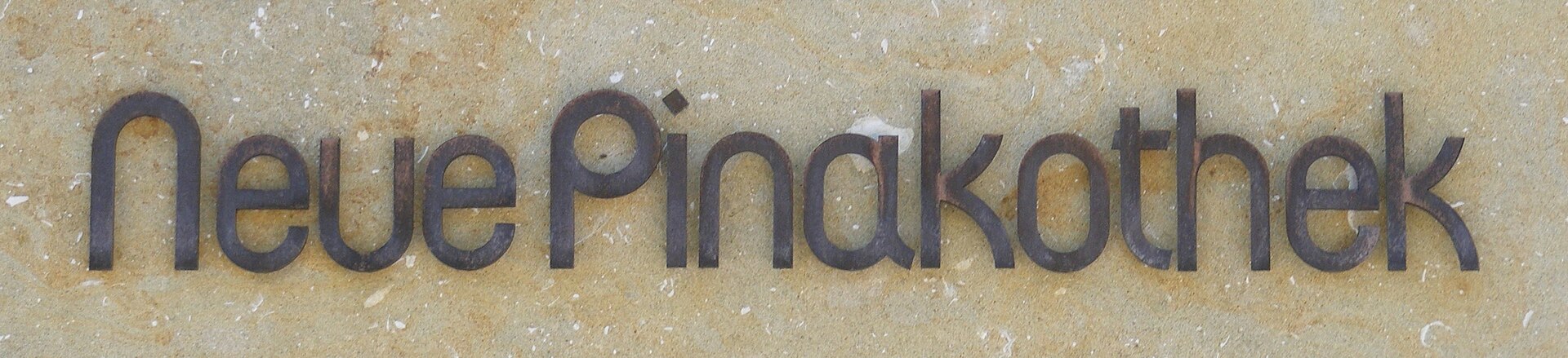 The building's name, carved in stone