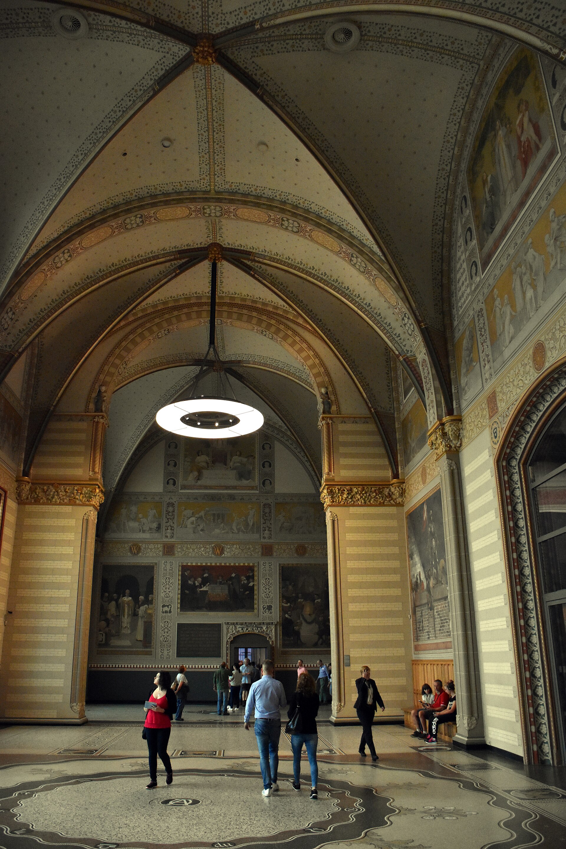 The Great Hall, its vaults and wall paintings above a mosaic and terrazzo floor