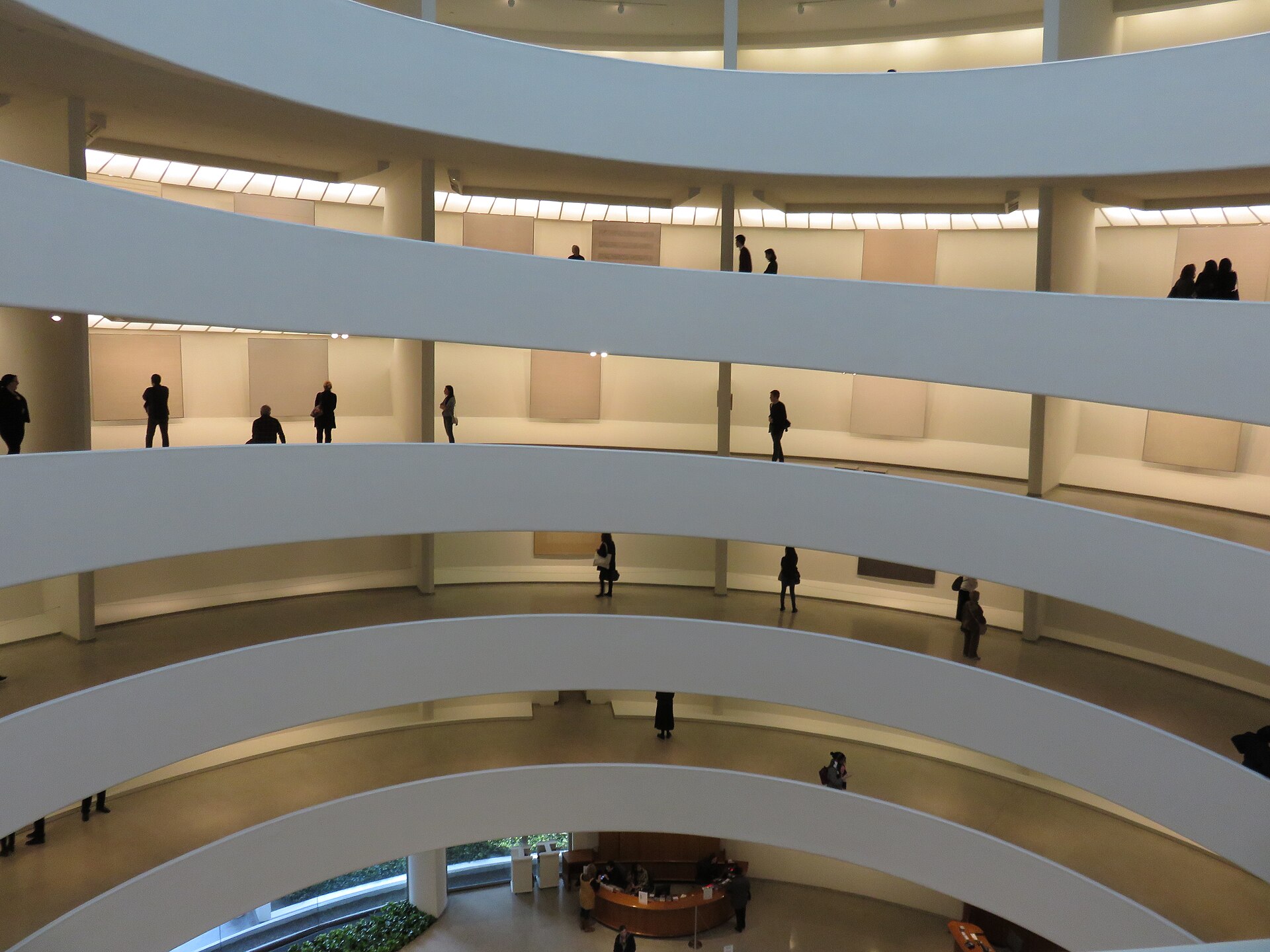 Looking up through the spiral ramp of the Guggenheim Museum toward the glass dome