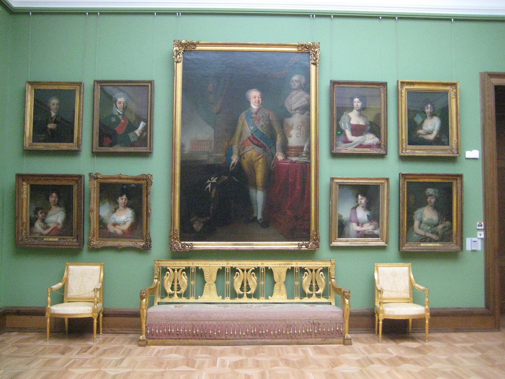 Hall of 18th-century portraits by Borovikovsky, hung floor to cornice on pale green walls