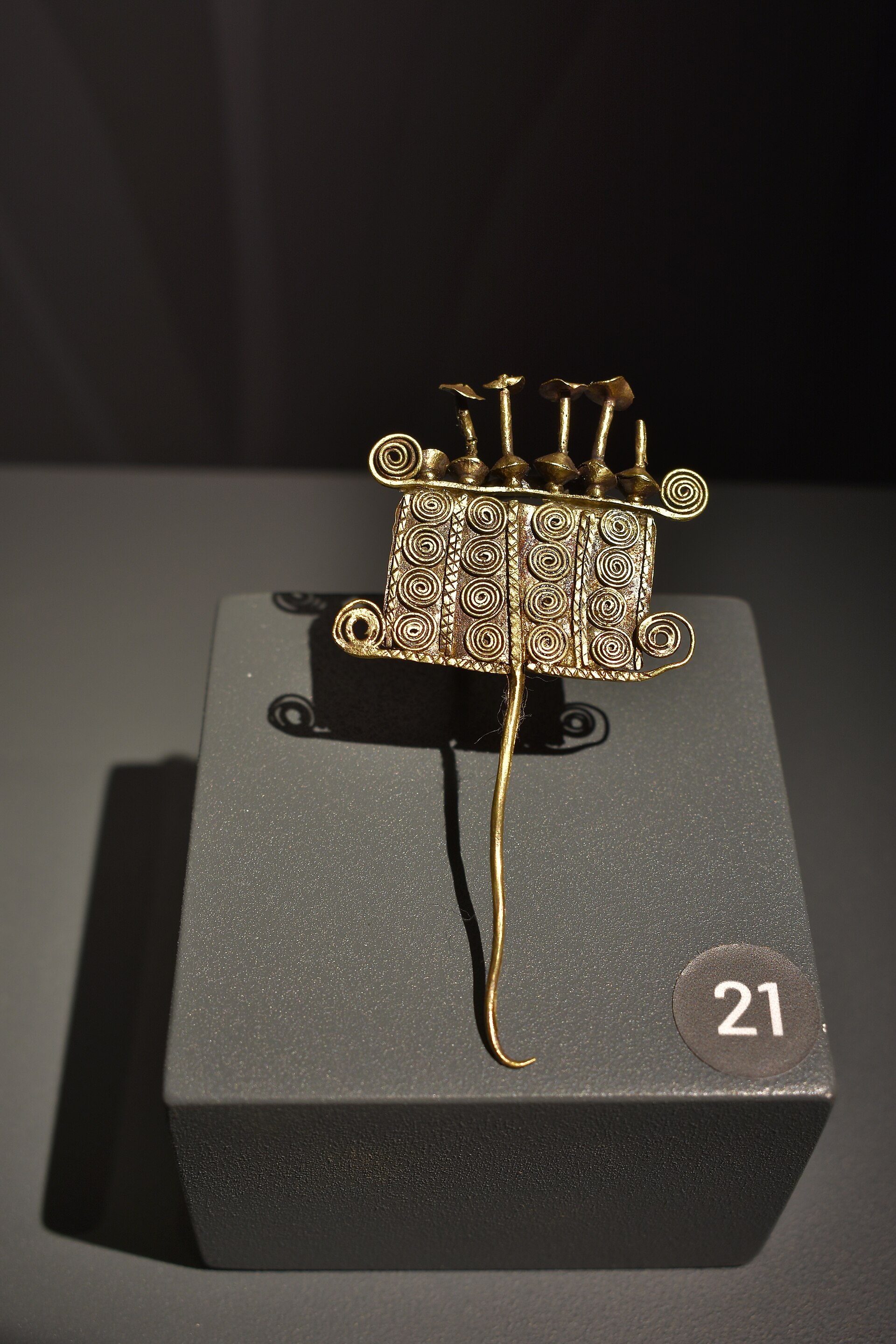 A gold ornament on display