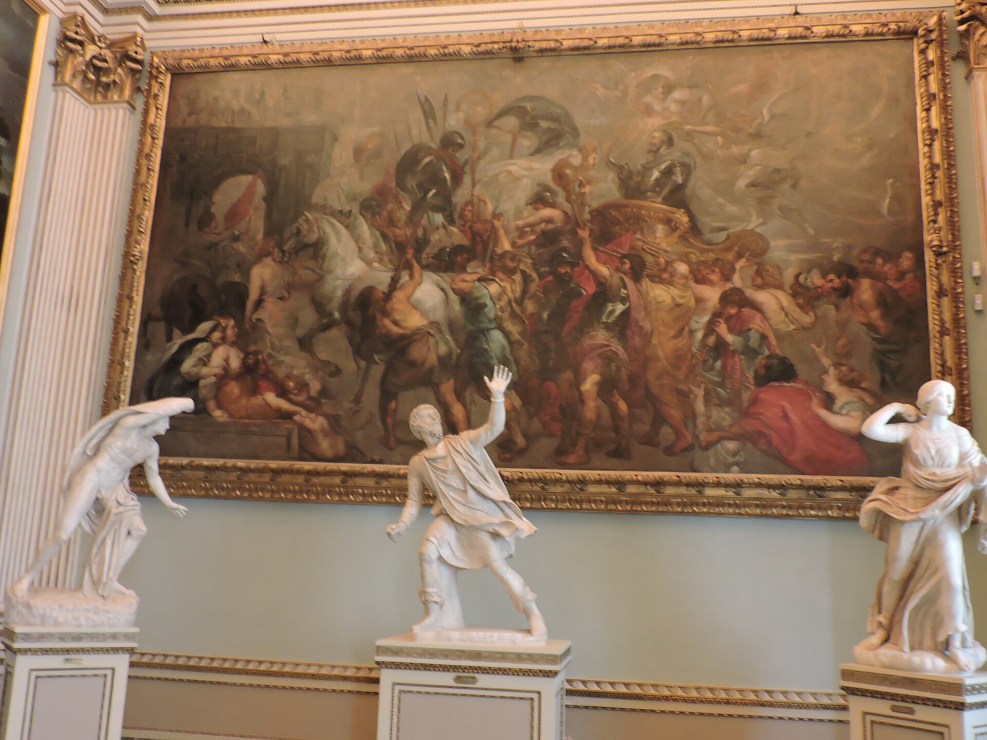The Niobe Room, ancient marble statues on plinths beneath a large framed painting and further sculpture